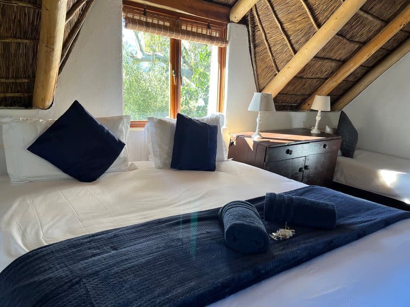 En-suite bedroom under the thatch at the Blue Butterfly