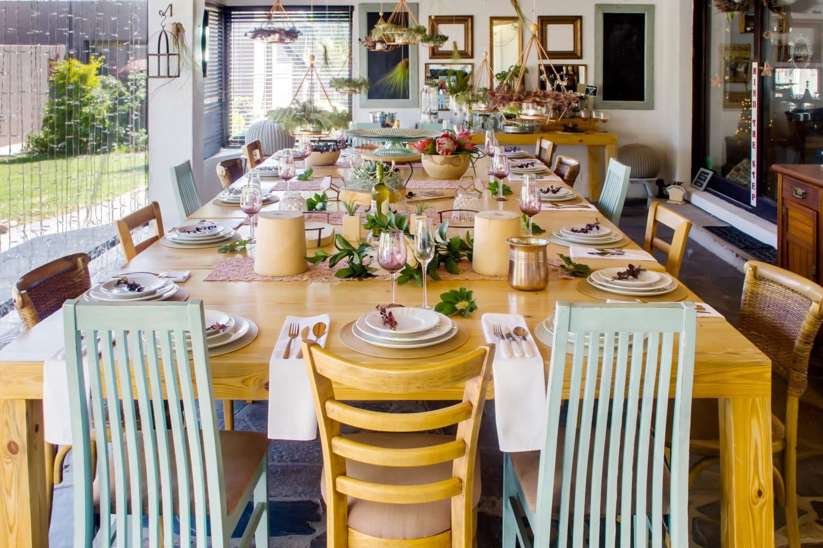 Long brunch table set for guests at Vin Boho Guesthouse
